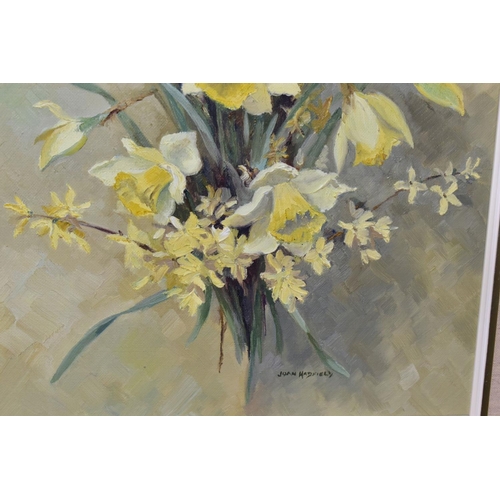 699 - JOAN HADFIELD (20TH CENTURY), two oil on canvas flower studies, the first depicts daffodils and yell... 