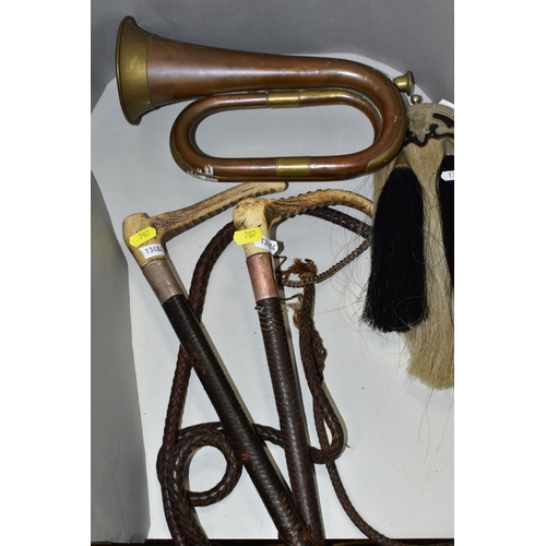 707 - TWO LEATHER WHIPS, bone handles, metal mounts one with engraved coronet, worn condition, with a semi... 