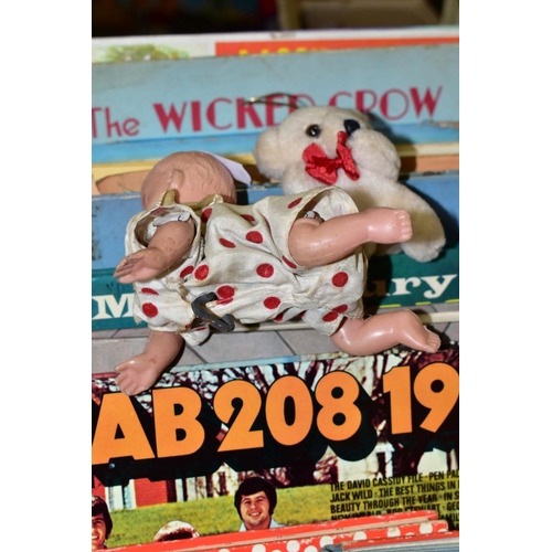 715 - A CLOCKWORK PLASTIC CRAWLING BABY DOLL, marked 'Foreign', working order but has some paint loss and ... 