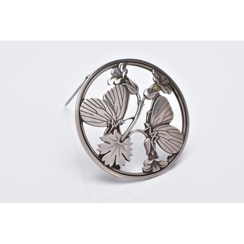 85 - A SILVER GEORG JENSEN BUTTERFLY BROOCH, circular openwork form, by Arno Malinowski 283, signed to th... 