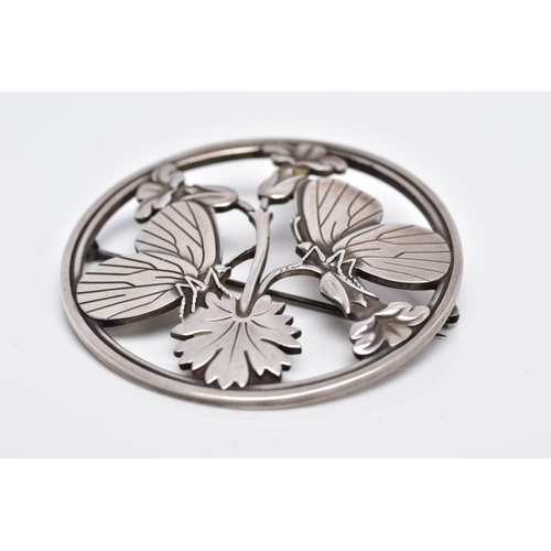 85 - A SILVER GEORG JENSEN BUTTERFLY BROOCH, circular openwork form, by Arno Malinowski 283, signed to th... 