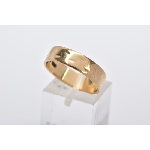 95 - A 9CT GOLD WIDE BAND, slight textured effect, approximate width 5.5mm, hallmarked 9ct gold London, r... 