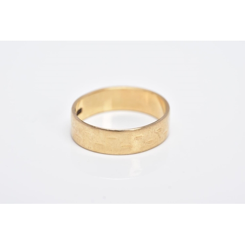 95 - A 9CT GOLD WIDE BAND, slight textured effect, approximate width 5.5mm, hallmarked 9ct gold London, r... 