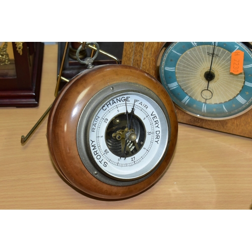 396 - TWO MANTEL CLOCKS AND A BAROMETER, comprising an Edwardian portico mahogany stained mantel clock, ci... 