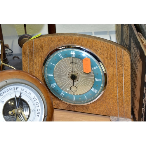 396 - TWO MANTEL CLOCKS AND A BAROMETER, comprising an Edwardian portico mahogany stained mantel clock, ci... 