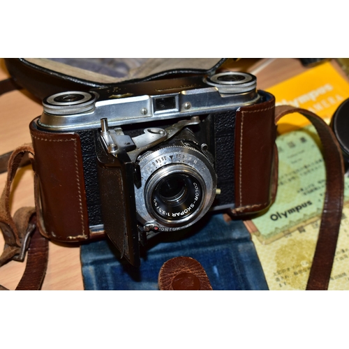 753 - AN ORIGINAL OLYMPUS F HALF FRAME FILM CAMERA fitted with a 38mm f1.8 Olympus Zuiko lens and F T expo... 