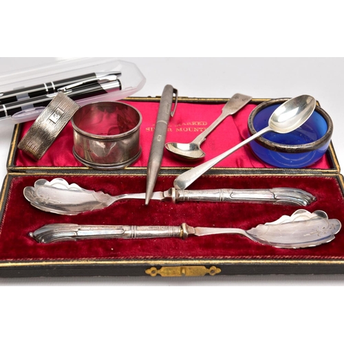 183 - A BOX OF SILVER ITEMS AND PENS, to include a fiddle pattern sauce spoon, with an engraved monogram h... 