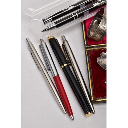 183 - A BOX OF SILVER ITEMS AND PENS, to include a fiddle pattern sauce spoon, with an engraved monogram h... 