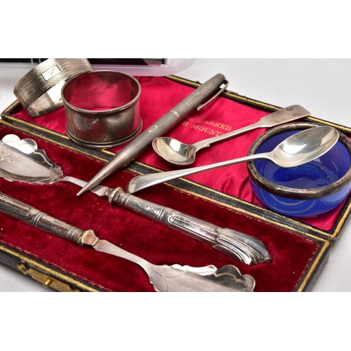 183 - A BOX OF SILVER ITEMS AND PENS, to include a fiddle pattern sauce spoon, with an engraved monogram h... 