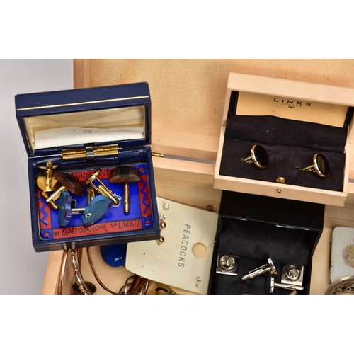 187 - A WOODEN BOX WITH CONTENTS, to include a pair of 9ct white gold cubic zirconia earrings, each with a... 