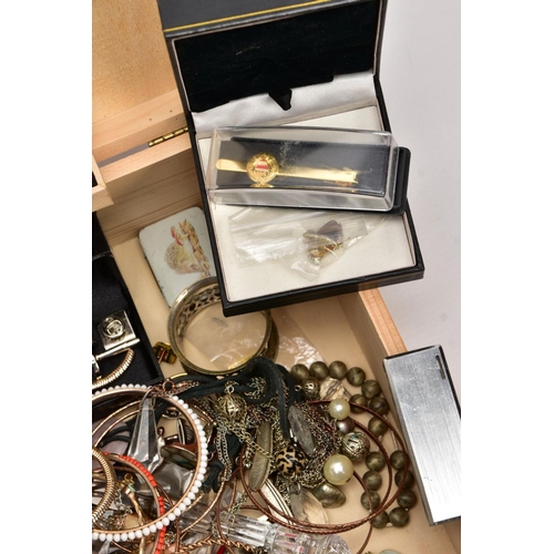 187 - A WOODEN BOX WITH CONTENTS, to include a pair of 9ct white gold cubic zirconia earrings, each with a... 