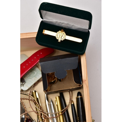 187 - A WOODEN BOX WITH CONTENTS, to include a pair of 9ct white gold cubic zirconia earrings, each with a... 