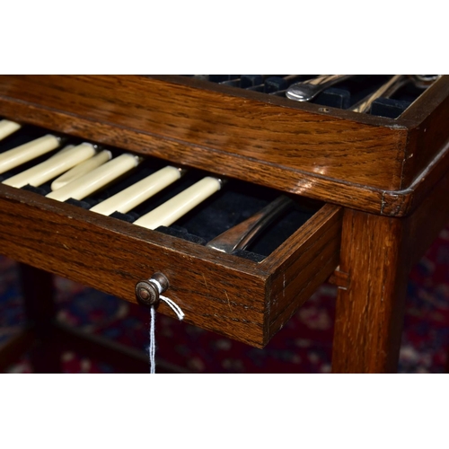 209 - AN OAK AND WALNUT VENEERED CANTEEN, possibly 1940/50's, opening top and a draw complete with 'Viners... 