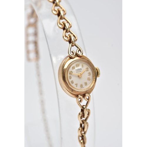 213 - A 9CT GOLD HAND WOUND ROLEX TUDOR LADY'S WRISTWATCH, a round case measuring approximately 15mm in di... 