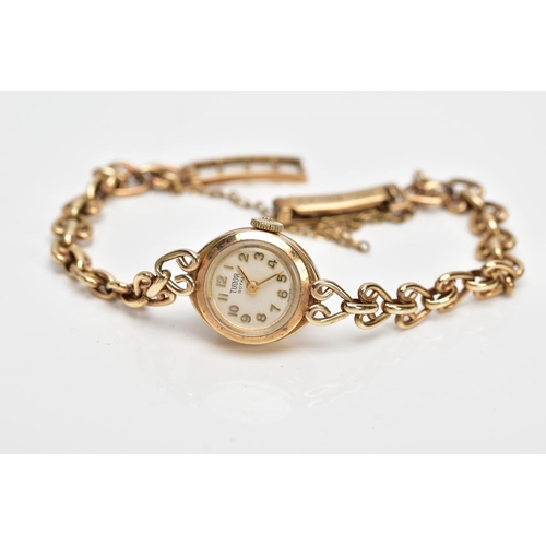 213 - A 9CT GOLD HAND WOUND ROLEX TUDOR LADY'S WRISTWATCH, a round case measuring approximately 15mm in di... 
