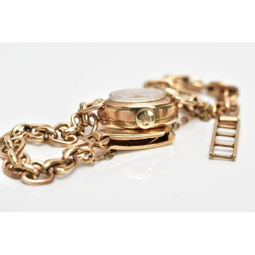 213 - A 9CT GOLD HAND WOUND ROLEX TUDOR LADY'S WRISTWATCH, a round case measuring approximately 15mm in di... 