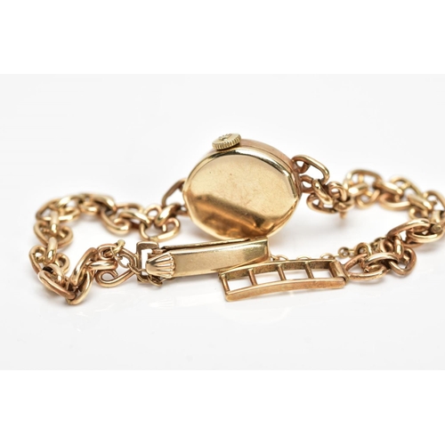 213 - A 9CT GOLD HAND WOUND ROLEX TUDOR LADY'S WRISTWATCH, a round case measuring approximately 15mm in di... 