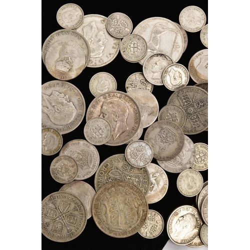 221 - A PLASTIC BAG OF PRE 1947 SILVER COINS, silver three pence to half crowns over 500 grams