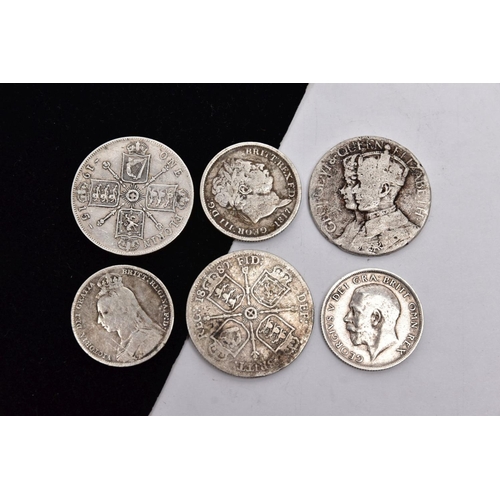 222 - A GROUP OF SILVER COINS AND A MEDALLION to include a George III 1817 shilling, a Victoria 1887 flori... 