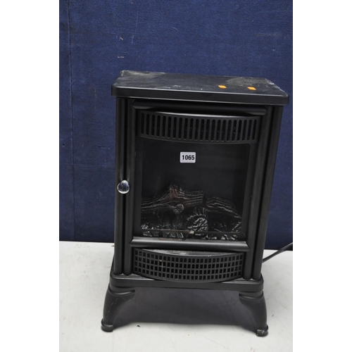 1065 - A BLYSS LDBL05A LOG BURNER EFFECT ELECTRIC HEATER and a Logik 16ins LCD TV (no remote, marks to scre... 