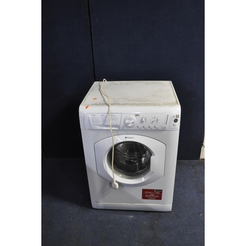 1071 - A HOTPOINT AQUARIUS WML520 WASHING MACHINE (PAT pass and powers up but not checked any further)