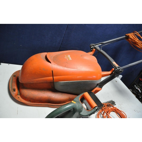 1075 - A FLYMO HOVER COMPACT 300 LAWN MOWER (PAT pass and working) and a Black and Decker hedge trimmer (un... 