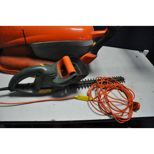 1075 - A FLYMO HOVER COMPACT 300 LAWN MOWER (PAT pass and working) and a Black and Decker hedge trimmer (un... 