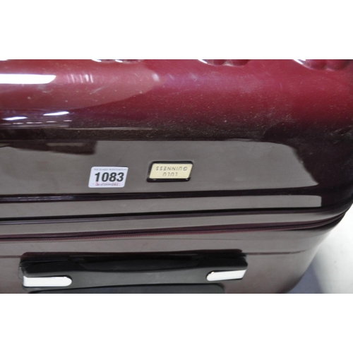 1083 - A LULU GUINESS HARD SHELL SUITCASE in Burgundy and 4 wheels, width 50cm x depth 30cm x height 79cm