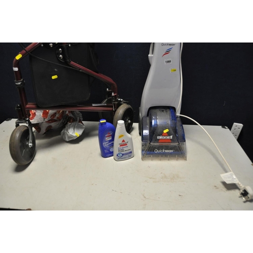 1088 - A BISSELL QUICKWASH Carpet Cleaner with two bottles of cleaning fluid (PAT pass and working) and a D... 