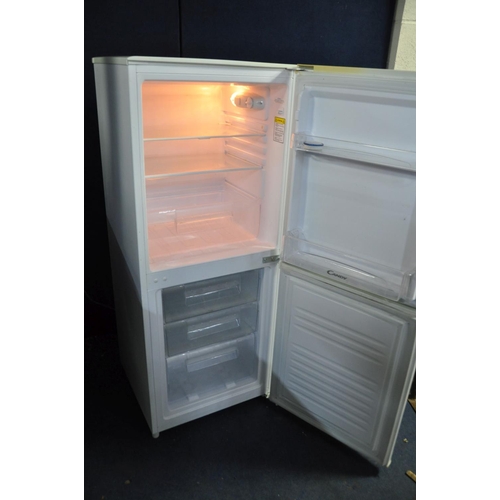 1113 - A CANDY FRIDGE FREEZER, width 55cm x height 137cm (PAT pass and working at 5 and -18 degrees)