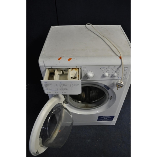 1114 - AN INDESIT IWC 6105 WASHING MACHINE, depth 54cm (PAT pass and powers up)