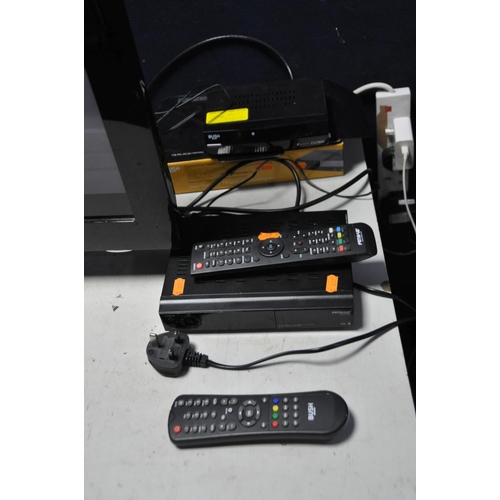 1137 - A LG 32LD350 32in ANALOGUE TV with remote, a Bush DVD player with remote, a Bush Free View box, a Bu... 