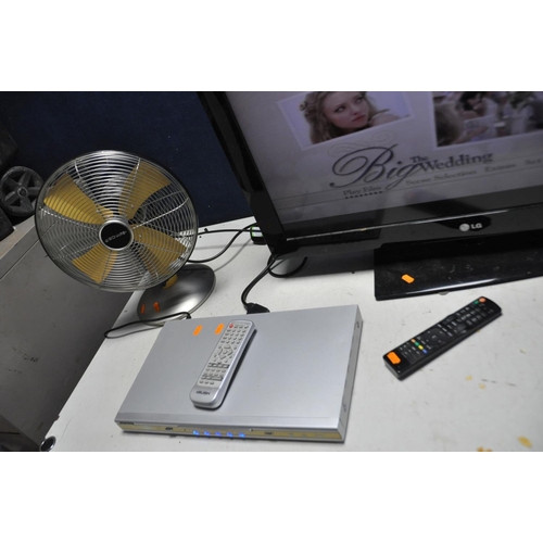 1137 - A LG 32LD350 32in ANALOGUE TV with remote, a Bush DVD player with remote, a Bush Free View box, a Bu... 