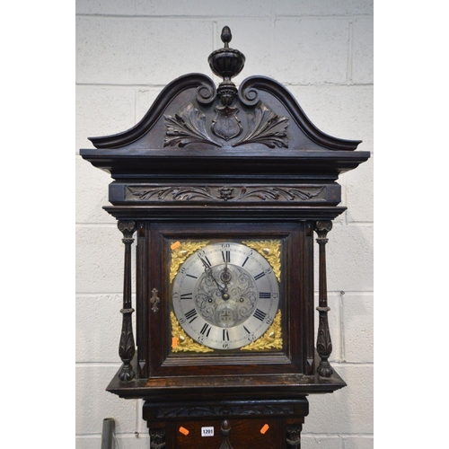 1201 - AN EARLY 20TH CENTURY OAK EIGHT DAY CHIMING LONGCASE CLOCK, the hood with an elaborate swan neck ped... 