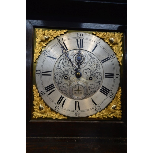 1201 - AN EARLY 20TH CENTURY OAK EIGHT DAY CHIMING LONGCASE CLOCK, the hood with an elaborate swan neck ped... 