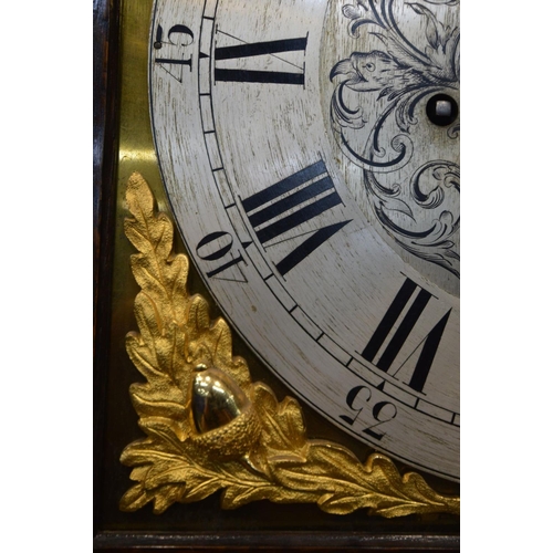 1201 - AN EARLY 20TH CENTURY OAK EIGHT DAY CHIMING LONGCASE CLOCK, the hood with an elaborate swan neck ped... 