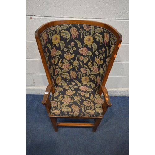 1202 - AN ARTS AND CRAFTS OAK ORKNEY CHAIR, black and florally upholstered back and matching removable cush... 