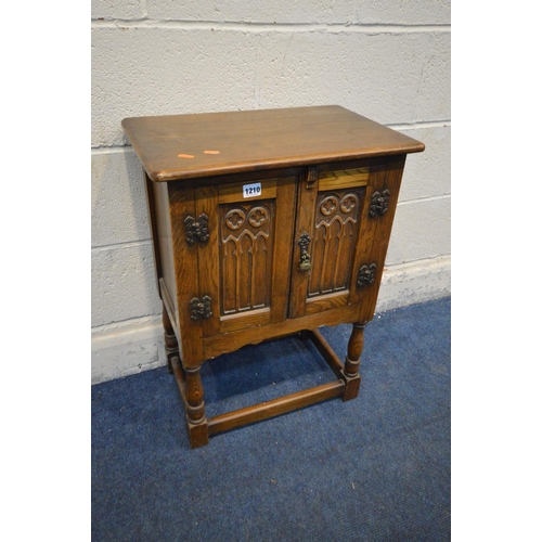 1210 - A SMALL OAK GOTHIC TWO DOOR CABINET, width 51cm x depth 33cm x height 68cm