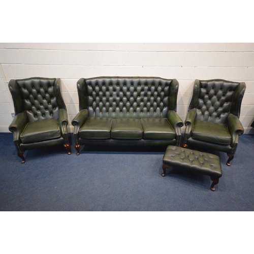 1213 - A FOUR PIECE GREEN LEATHER CHESTERFIELD SUITE, comprising a winged settee, width 170cm and a pair of... 