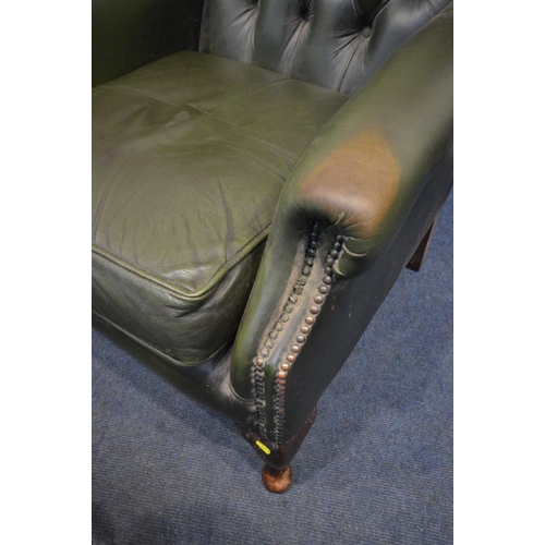 1213 - A FOUR PIECE GREEN LEATHER CHESTERFIELD SUITE, comprising a winged settee, width 170cm and a pair of... 