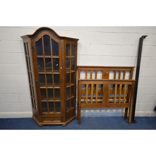 1217 - AN OAK CANTED SINGLE DOOR DISPLAY CABINET with four fixed shelves, width 109cm x depth 31cm x height... 