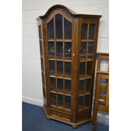 1217 - AN OAK CANTED SINGLE DOOR DISPLAY CABINET with four fixed shelves, width 109cm x depth 31cm x height... 