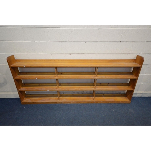 1220 - A LOW PINE THREE TIER OPEN BOOKCASE, length 244cm x depth 20cm x height 105cm