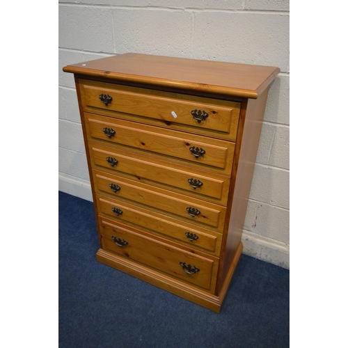 1228 - A  YOUNGER PITCH PINE CHEST OF SIX GRADUATED DRAWERS, width 78cm x depth 46cm x height 110cm