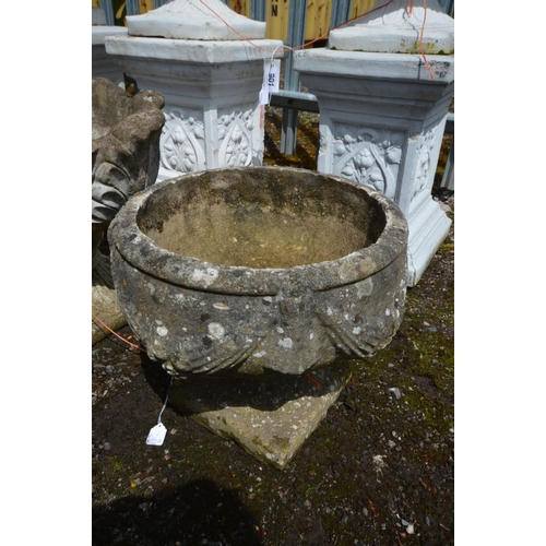 904 - TWO COMPOSITE GARDEN URNS, on of an acanthus leaf