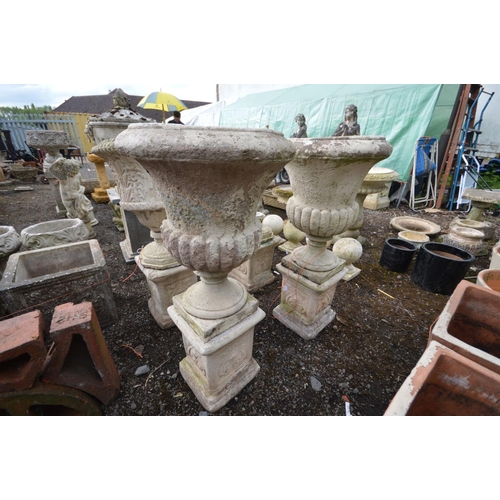 947 - A PAIR OF LARGE COMPOSITE CAMPANA URNS, on separate matched plinths with Art Nouveau decoration, lat... 