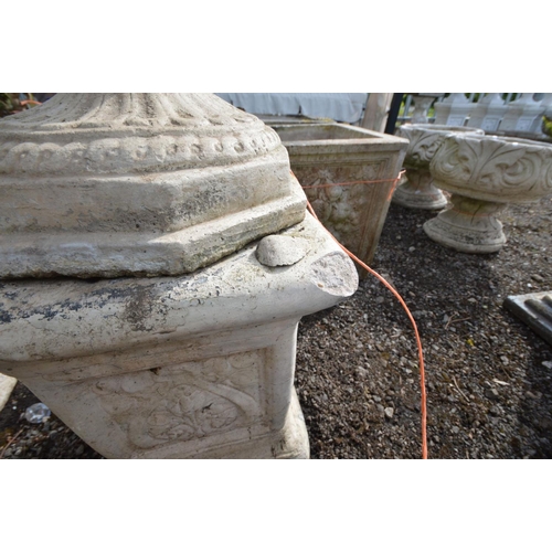 948 - A PAIR OF LARGE COMPOSITE FOLIATE DECORATED URNS with , on separate matched plinths with Art Nouveau... 