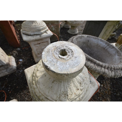 948 - A PAIR OF LARGE COMPOSITE FOLIATE DECORATED URNS with , on separate matched plinths with Art Nouveau... 