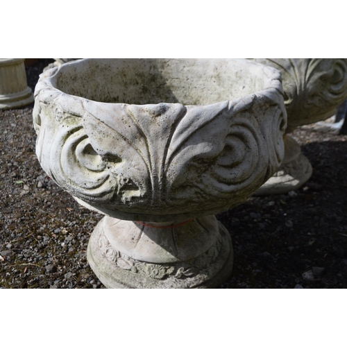 951 - A PAIR OF COMPOSITE FOLIATE GARDEN URNS, on separate bases, diameter 43cm x height 41cm