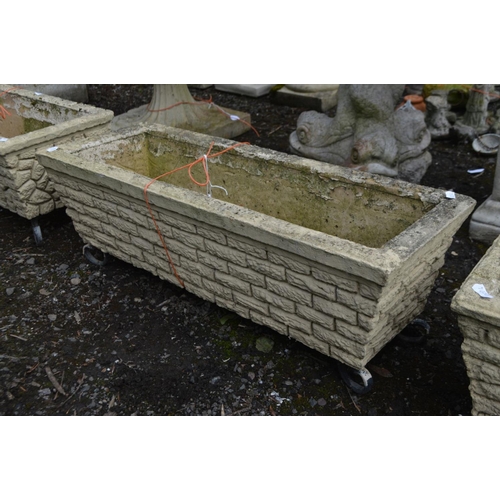 958 - A SET OF THREE COMPOSITE BRICK EFFECT RECTANGULAR PLANTERS, each length 70cm